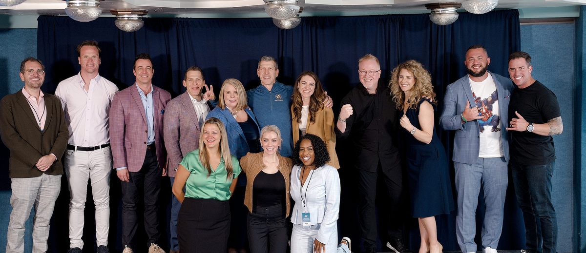 FirstHome IQ Ambassadors gathered on stage at an industry event